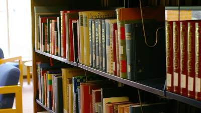 A shelf of books in the Calvin College library.