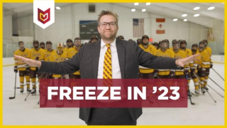 President Boer in a suit and tie holds his hands out with hockey team behind, FREEZE IN '23 graphic