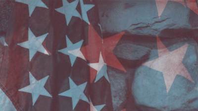 Graphic design of American flag's stars double-exposed on rocks.