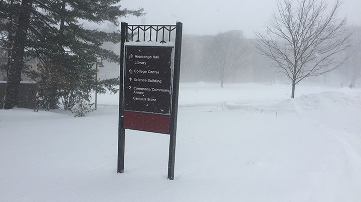 Calvin wayfinding sign stands in wintery conditions.