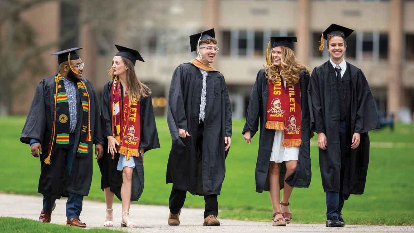 Calvin University Class of 2022 graduates walking to the arena.