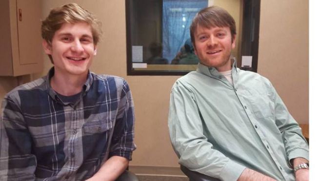 Nate Roels '17 and award-winning filmmaker and Calvin professor Sam Smartt seated in an editing lab at Calvin University.