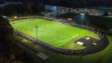 Nightime soccer match played under the lights at Zuidema Field.
