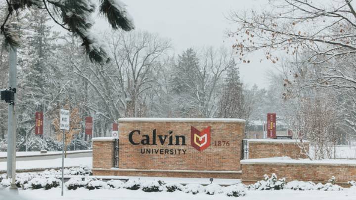 The Calvin University sign in winter