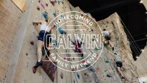 students climbing Calvin's rock wall