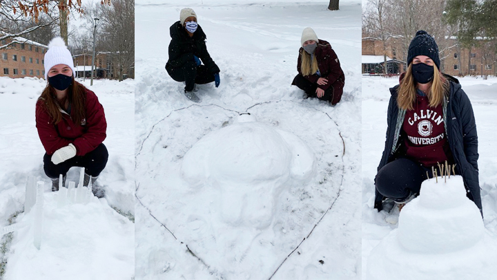 Students with masks creating snow sculptures on university campus.