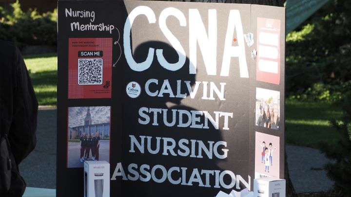 The CSNA poster on display at the annual Cokes and Clubs event.