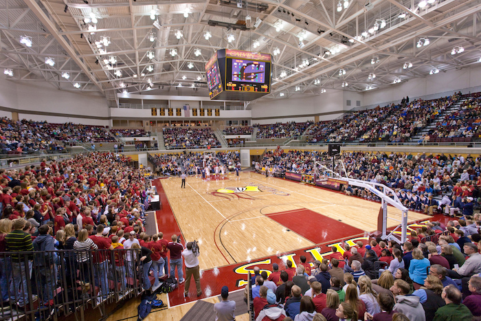 Van Noord Arena at Calvin University is full of spectators during a basketball game.