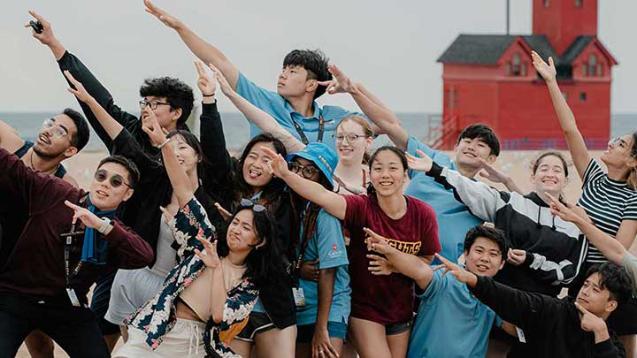 Calvin University new international students on the beach