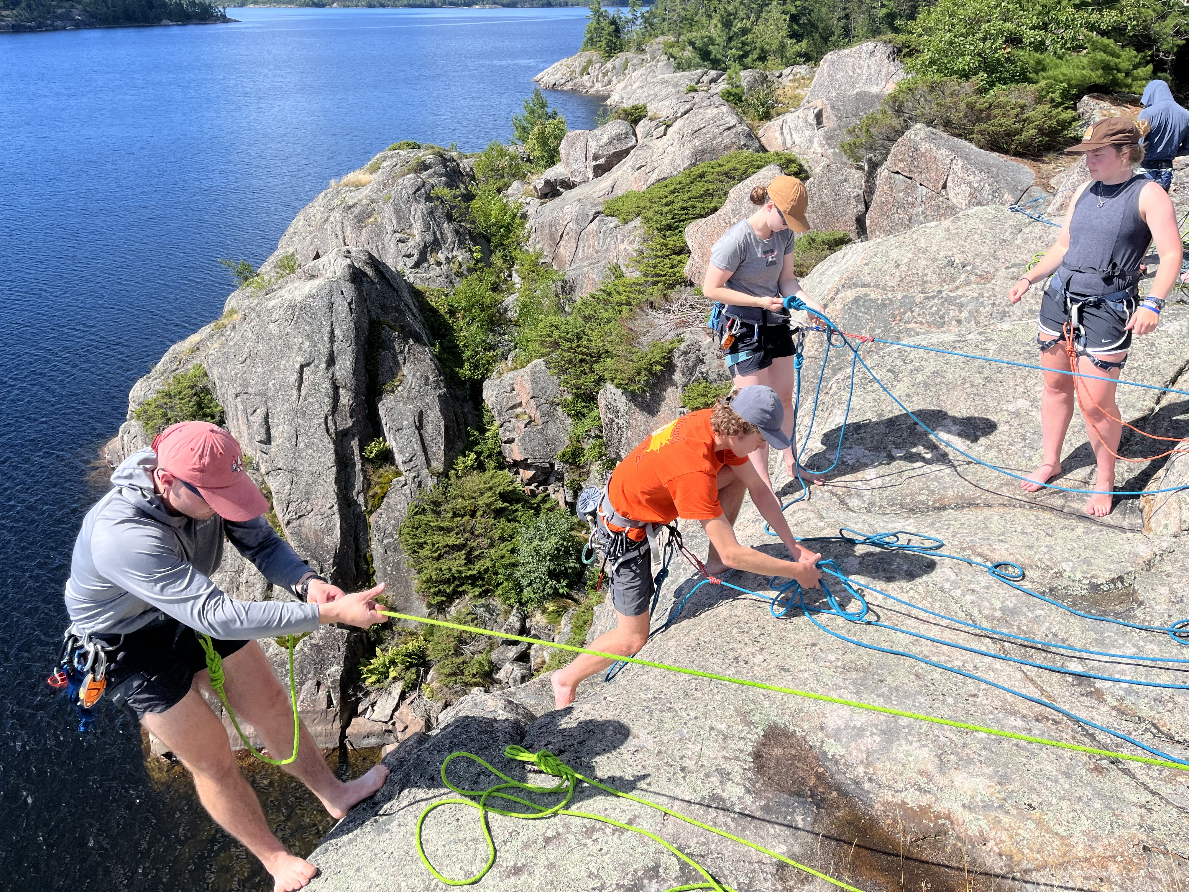 Calvin students rapeling down a rockface in the North Channel in Canada