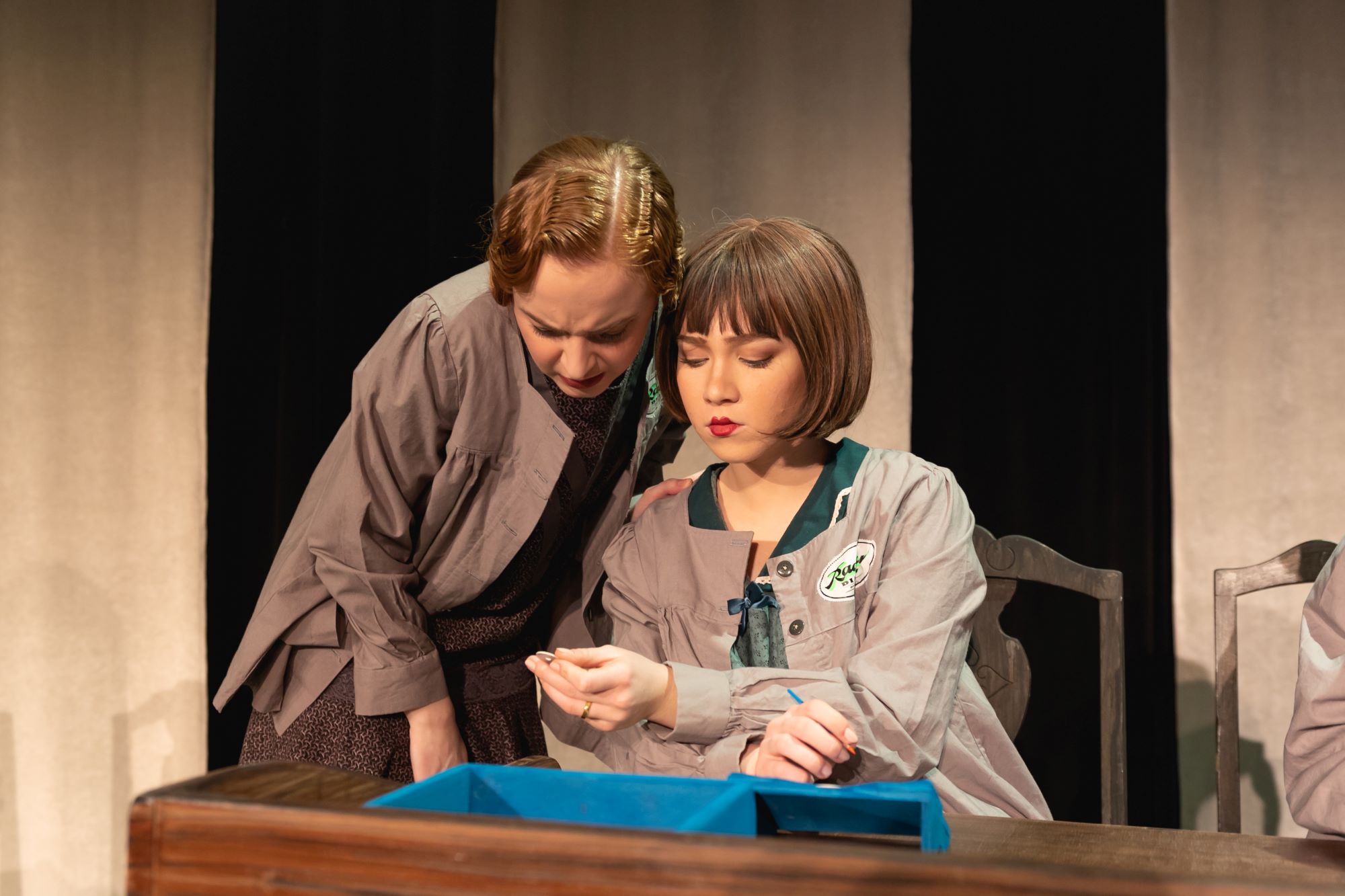 Two student actors on stage