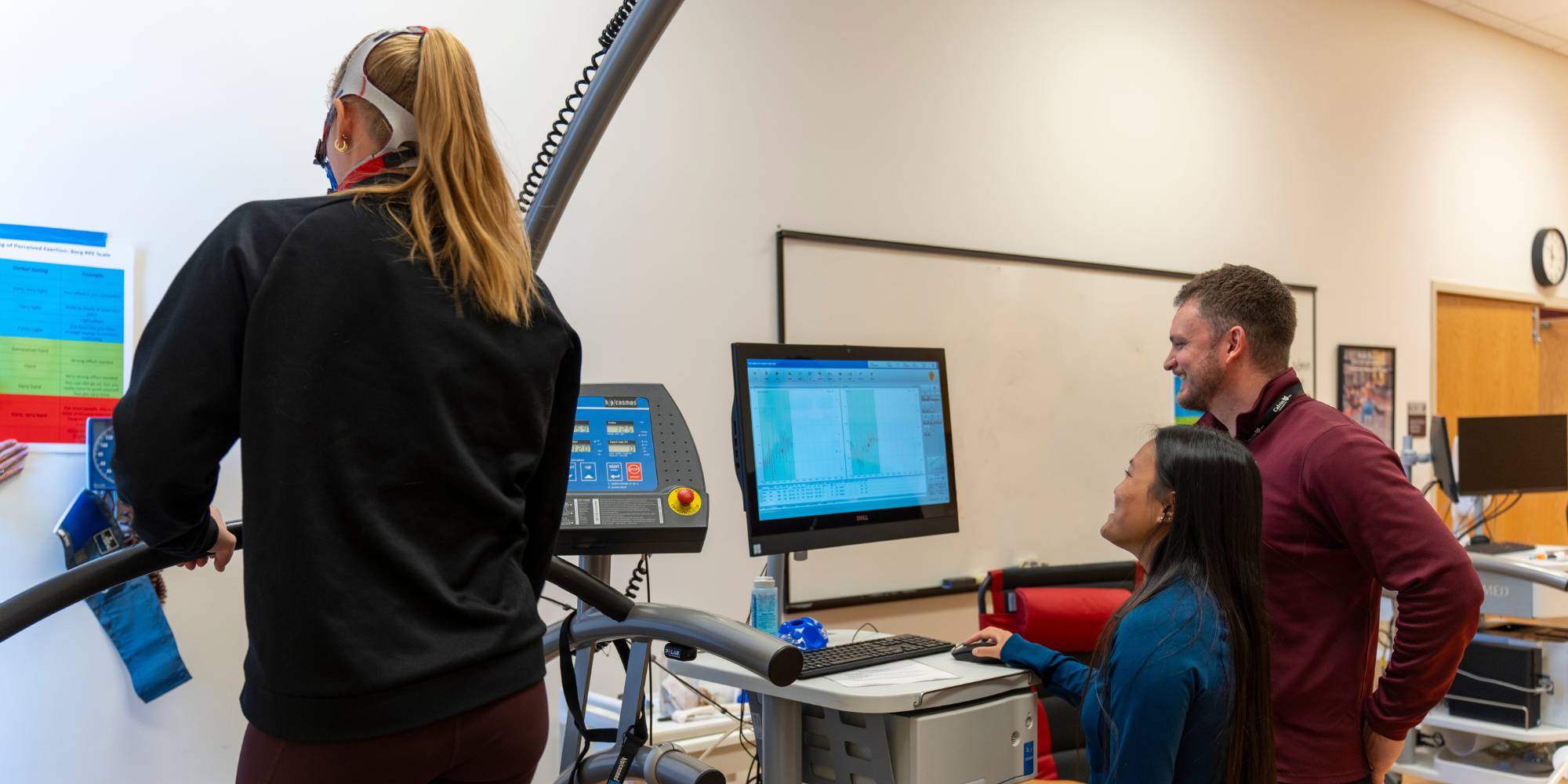 Calvin University students working in the School of Health's human performance lab.