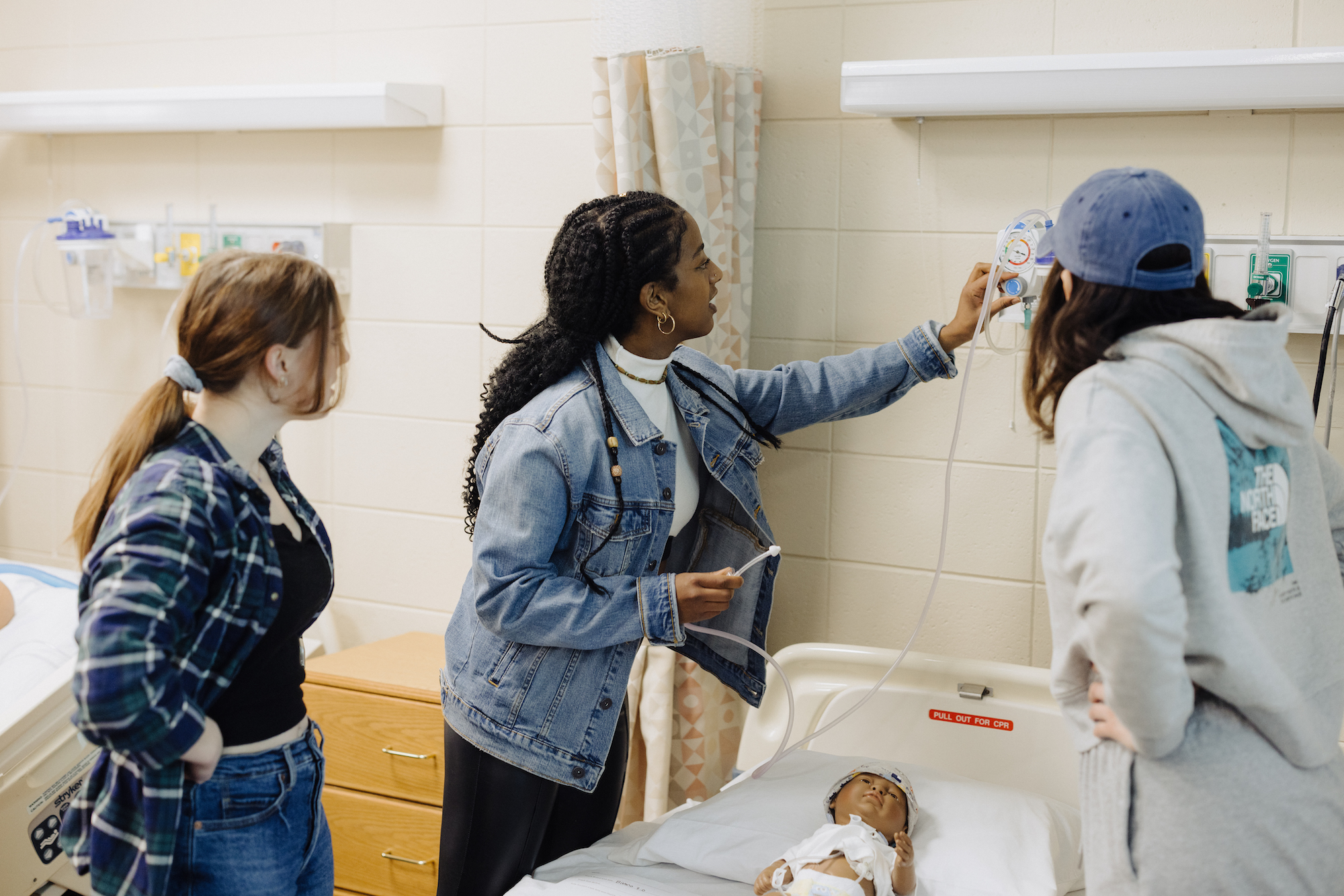 Three nursing students in the lab