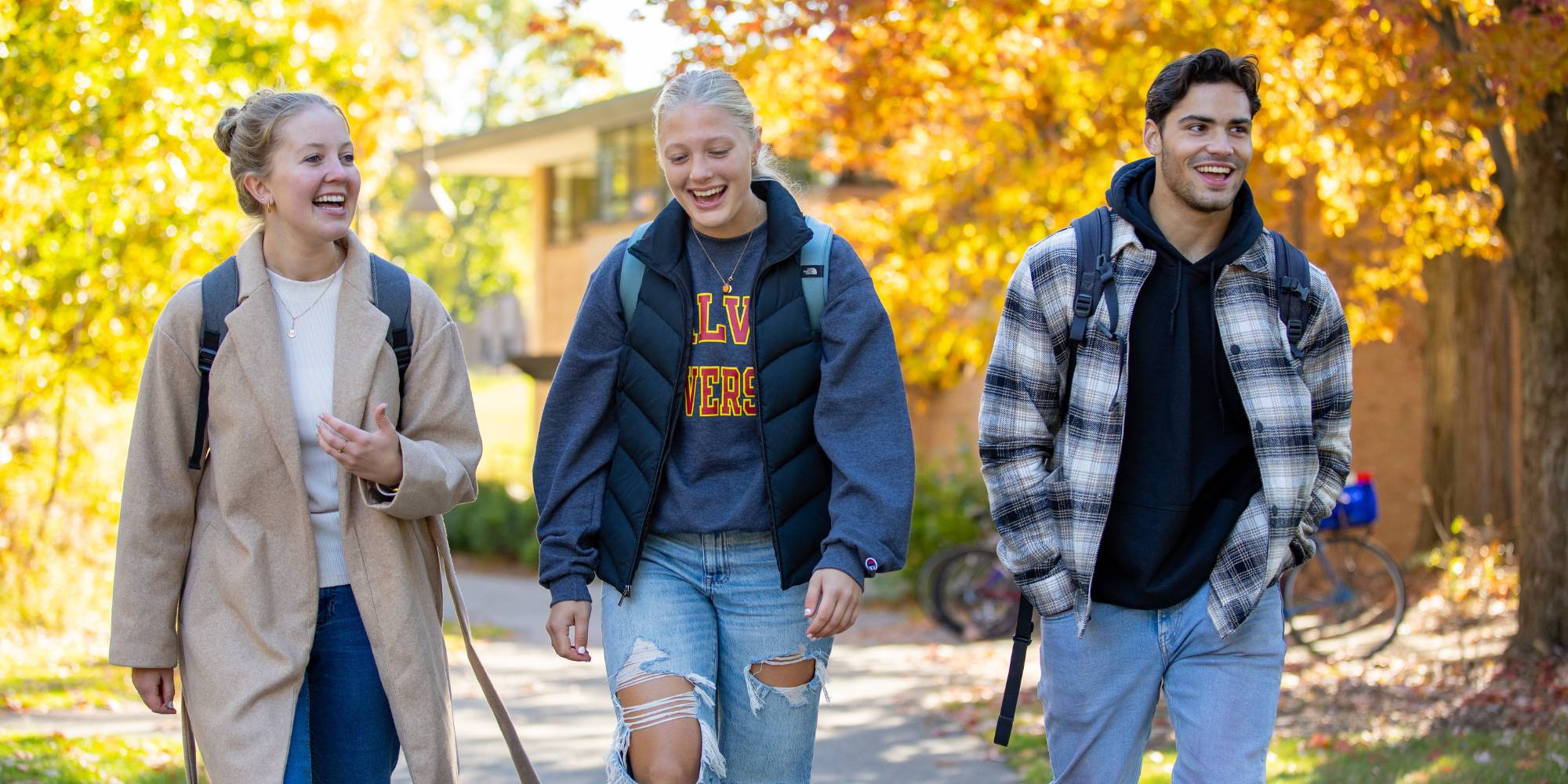 Calvin University students walking across campus.