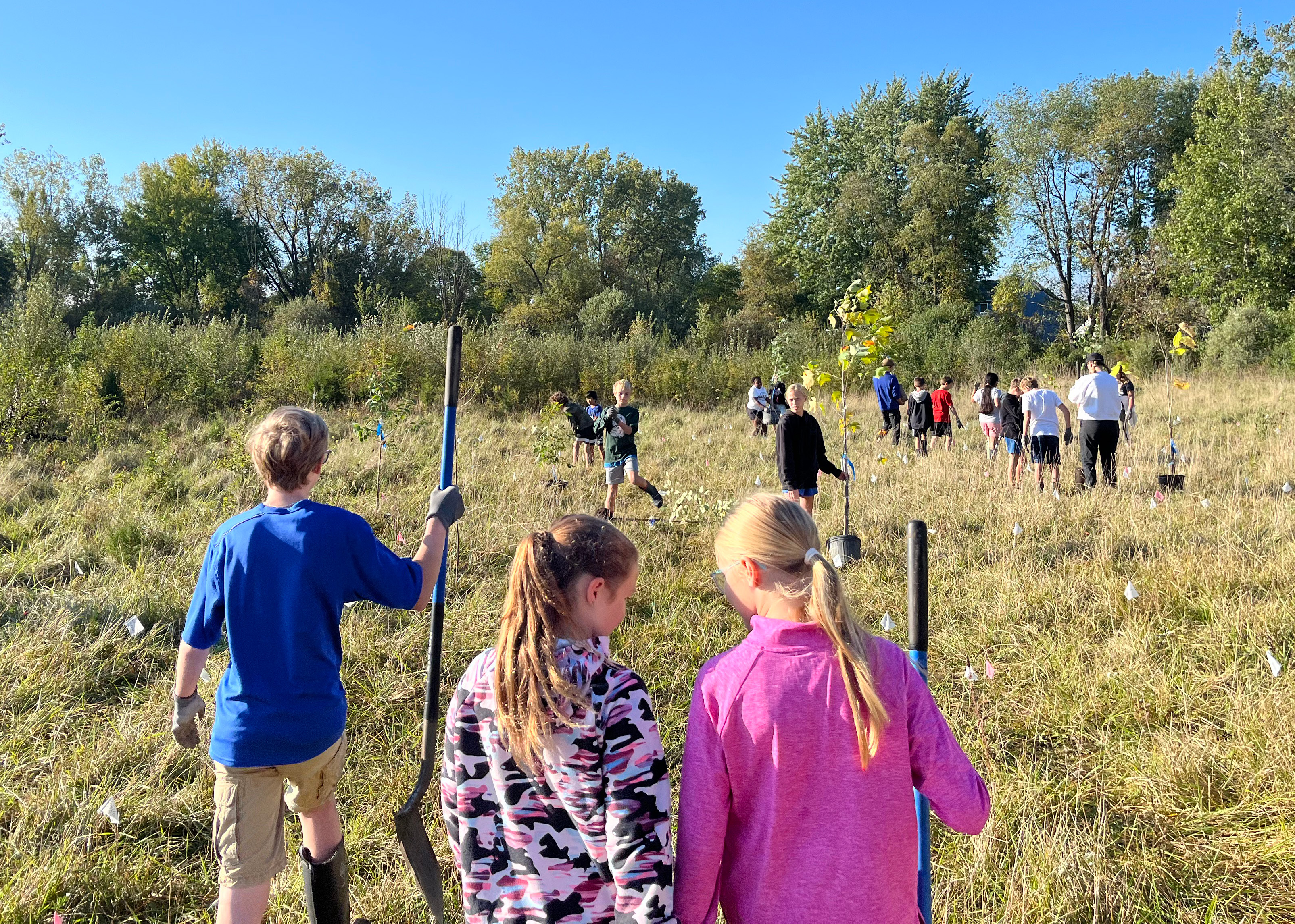 Students plant native trees