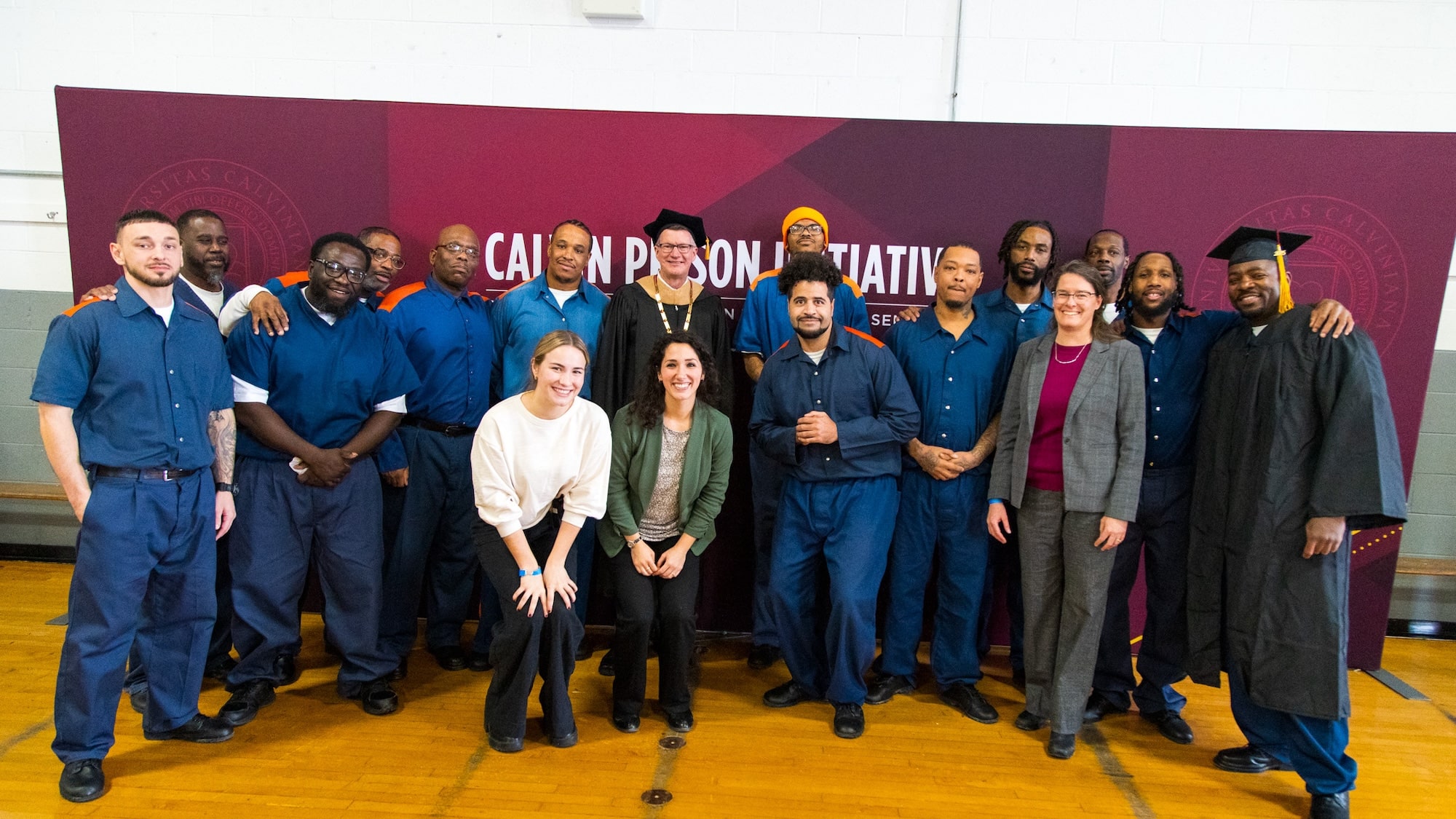 Group of students in the Calvin Prison Initiative program with President Elzinga