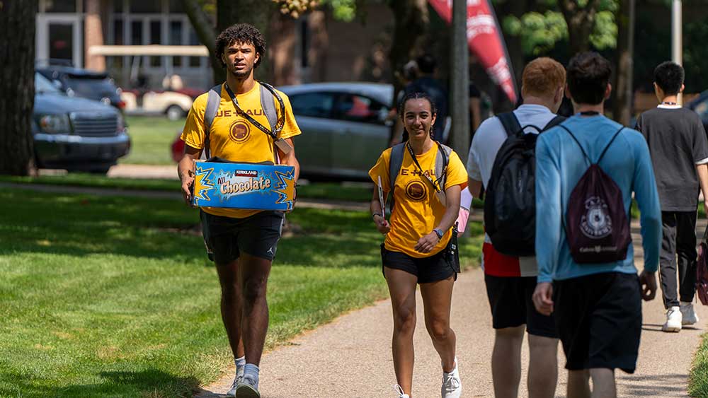 Current Calvin students helping new students move into the dorm