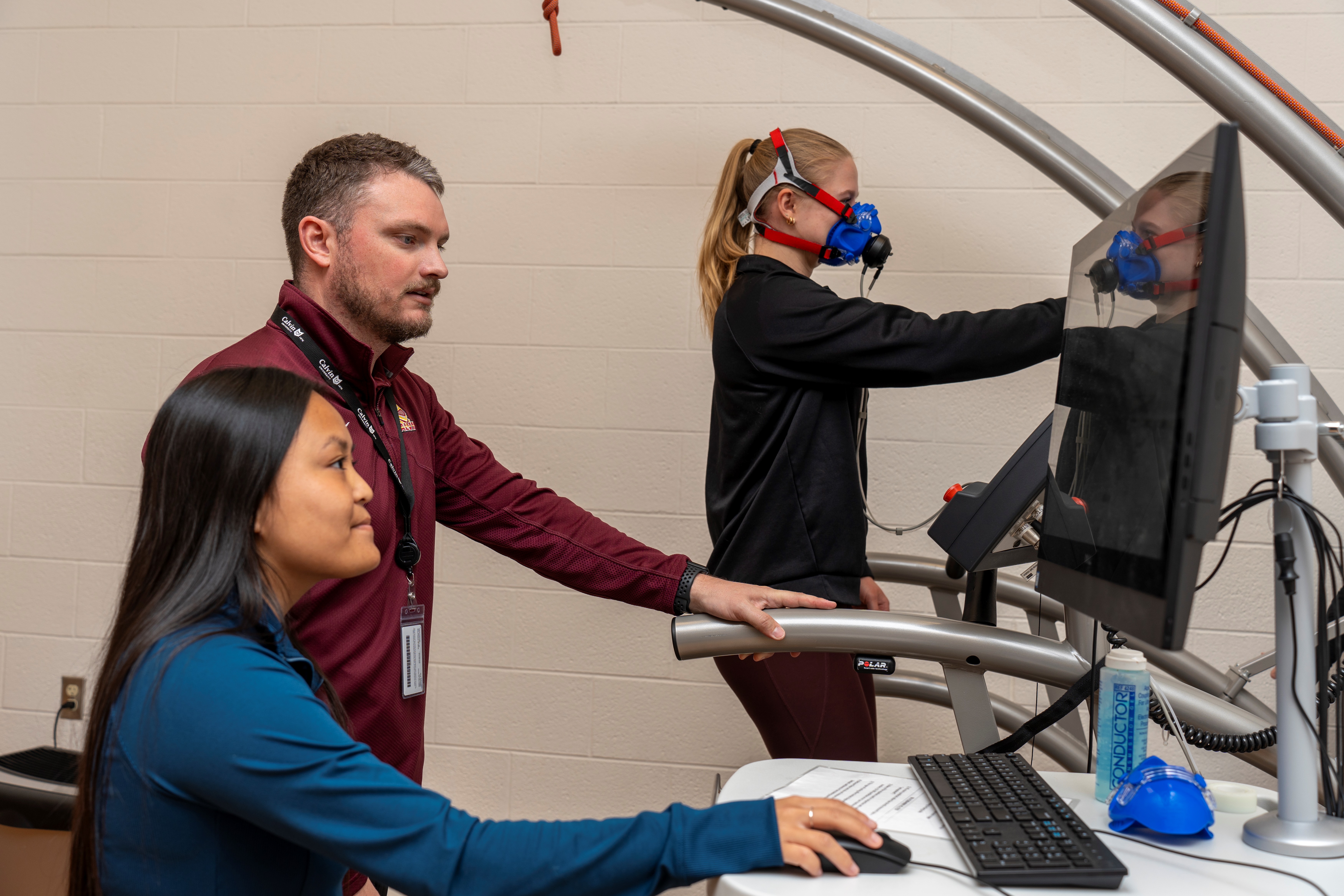 Student working in cardiac rehab