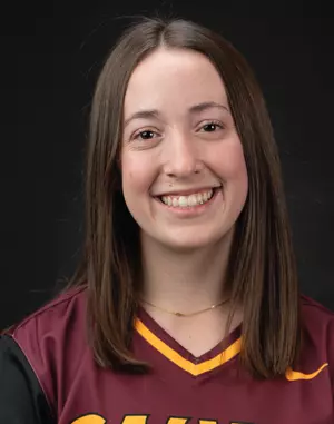 Photo of Lily Gaastra. She has mid-length dark brown hair, and her skin is white. 