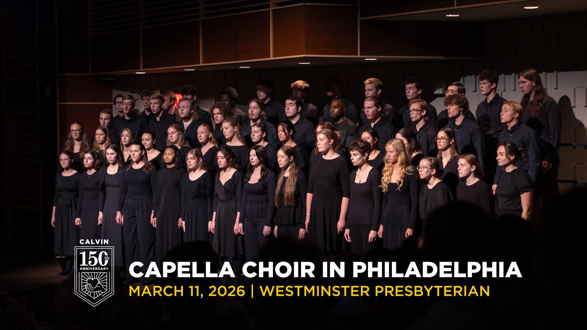 Capella choir from Calvin University in concert black singing on risers