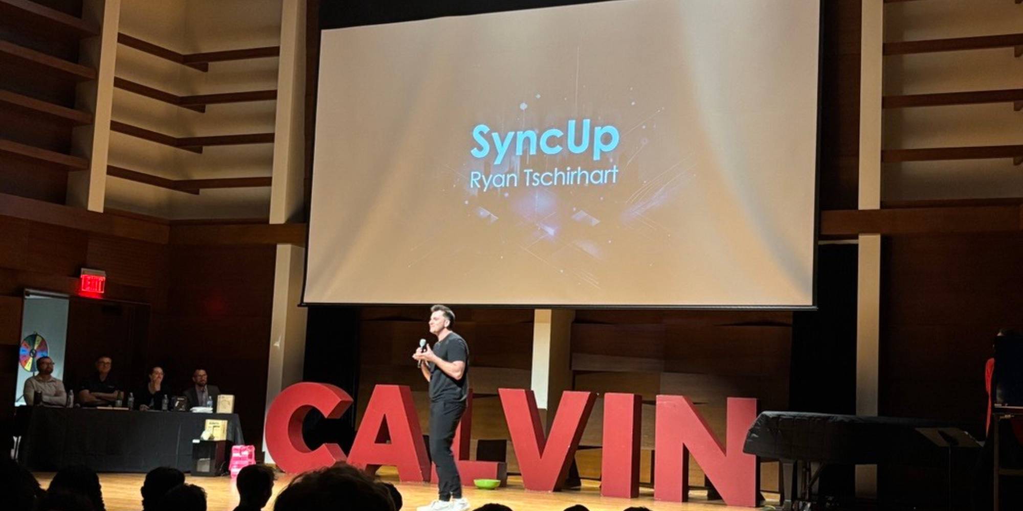 Ryan Tschirhart pitching his idea at Startup Garage's Pitch Up competition on Calvin University's campus.