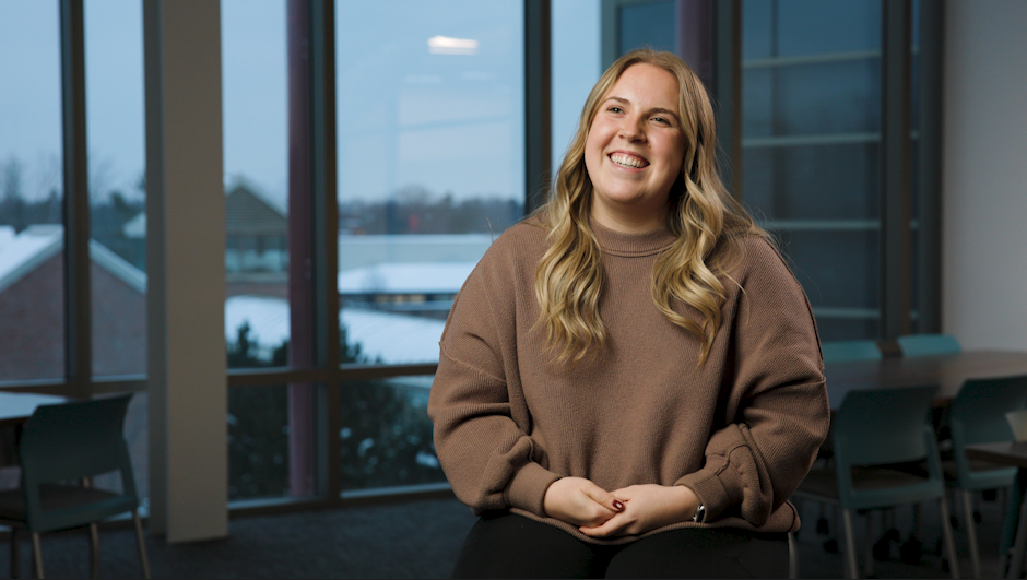Hannah smiling at the camera