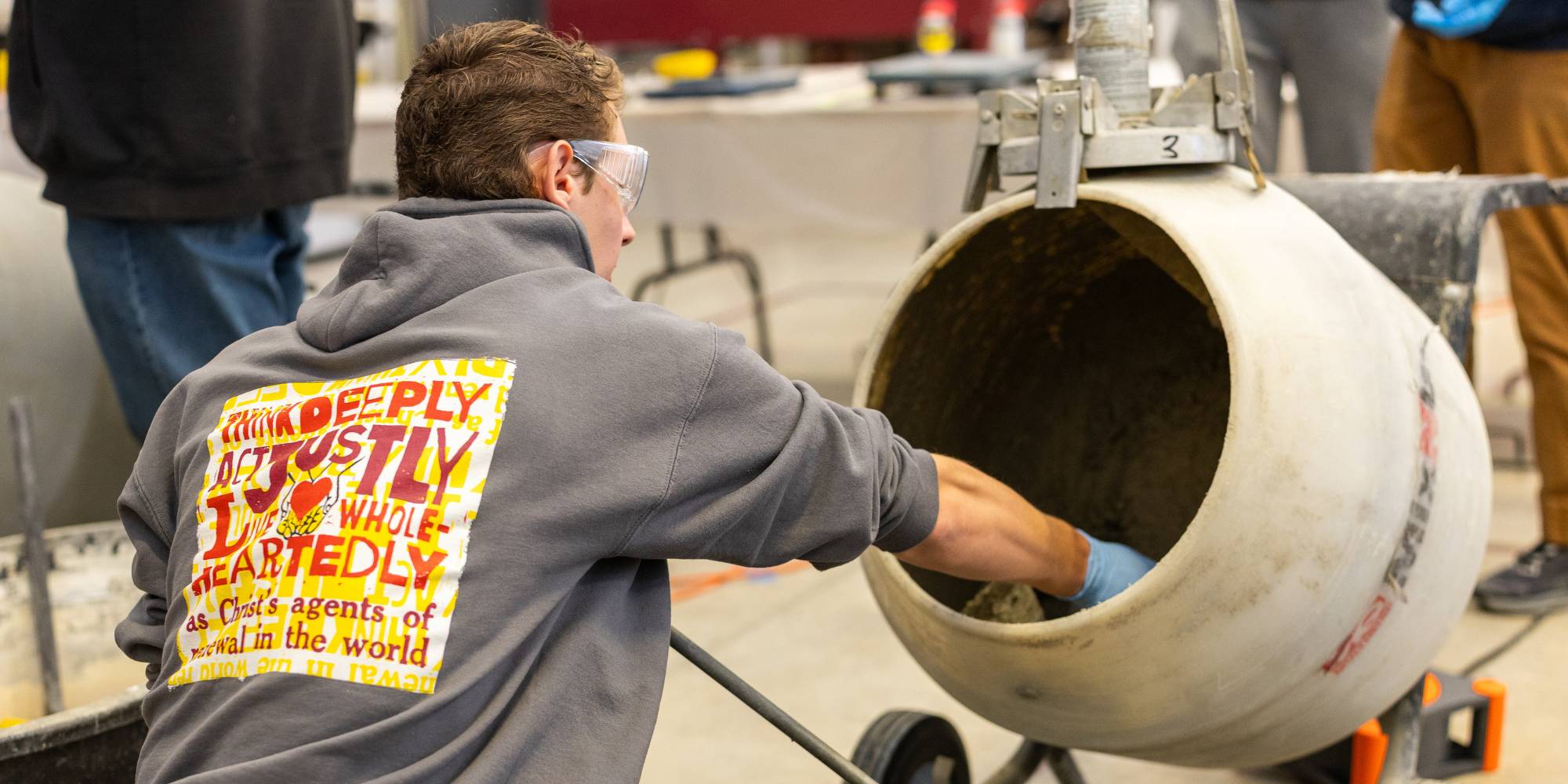 Student working in concrete lab