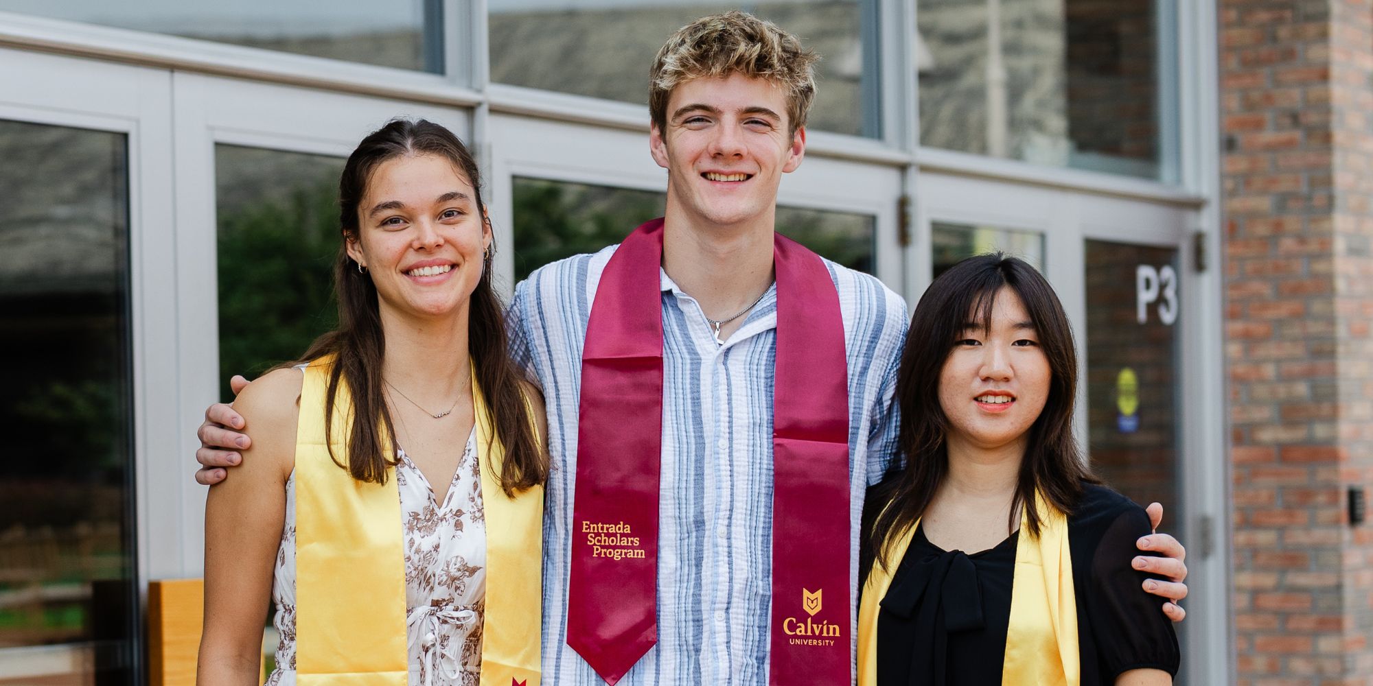 Three graduates from the Entrada Scholars Program in 2026