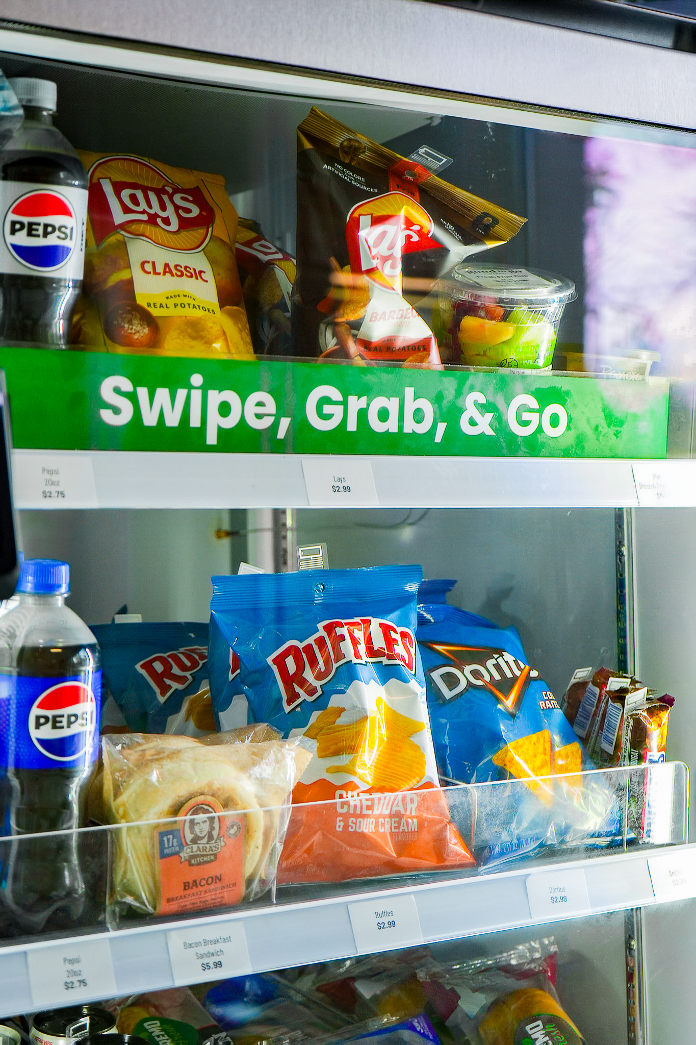 Fresh food vending machine with drinks, snacks, and a breakfast sandwich. 