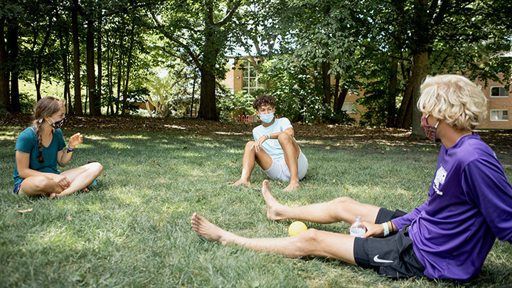 Students relax outside in between classes on Tuesday, Sept. 1.