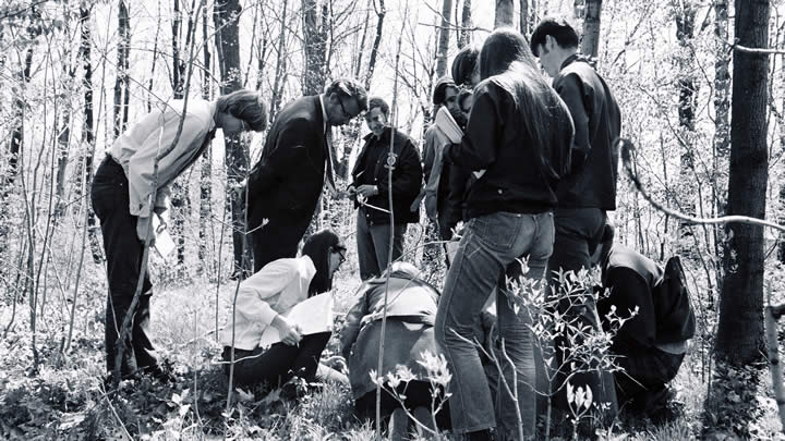 Al Gebben explores the Ecosystem Preserve with students.