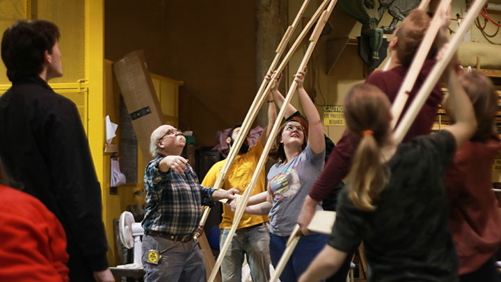 Students in "The Amish Project: What is the meaning of Forgiveness" course construct the set for the play that runs Feb. 1-3 at Calvin College.