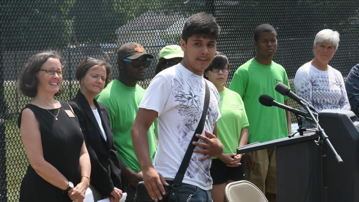 Diego Galvan, a member of The Plaster Creek Stewards' "Green Team," explains the importance of watershed restoration at a press conference this past summer where the group received $60,000 from the EPA.