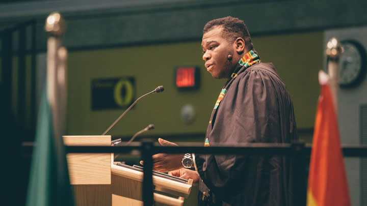 Jona Eigege delivers his remarks to the Class of 2015 on Saturday, May 23, 2015.