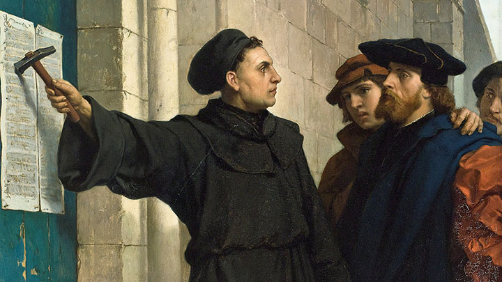 Martin Luther posting his 95 theses in 1517.