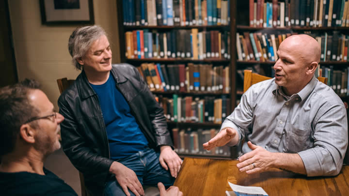 Paul Manata (right), Kevin Corcoran (left) and David Chalmers engage in a discussion during the workshop.