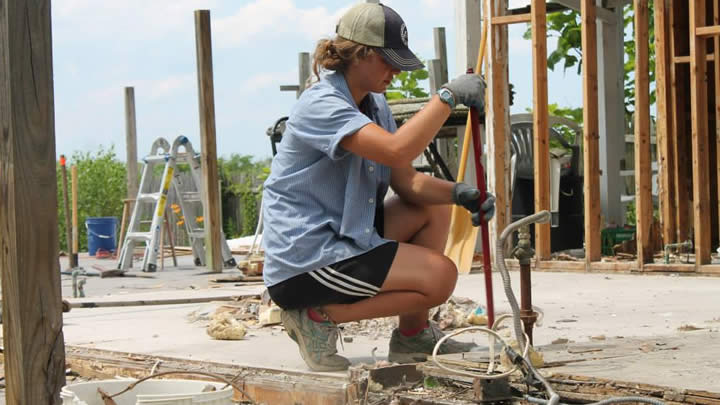 Senior Carolyn Brown spent a summer leading middle and high school groups in cleanup and rebuilding efforts in the aftermath of Superstorm Sandy.