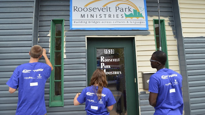 Students serve at Cook Library Center in Grand Rapids.