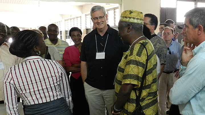 Joel Carpenter, director of Calvin’s Nagel Institute, center, talks with attendees during a planning meeting held in Accra, Ghana.