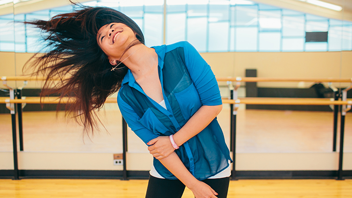 Student dancing in Calvin dance studio