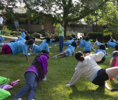 Girls exercising outside  