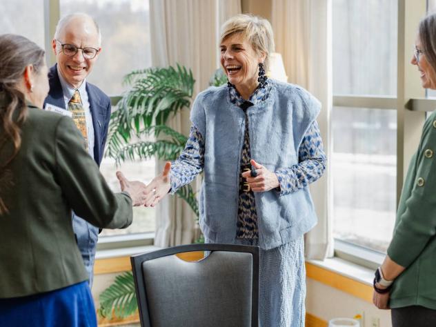 Princess Laurentien of the Netherlands greeting faculty on Calvin University's campus.