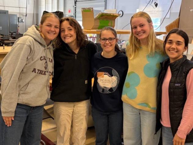 Five senior engineering students at Calvin University