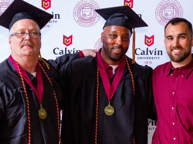 Three Calvin University graduates from the Calvin Prison Initiative's Class of 2026