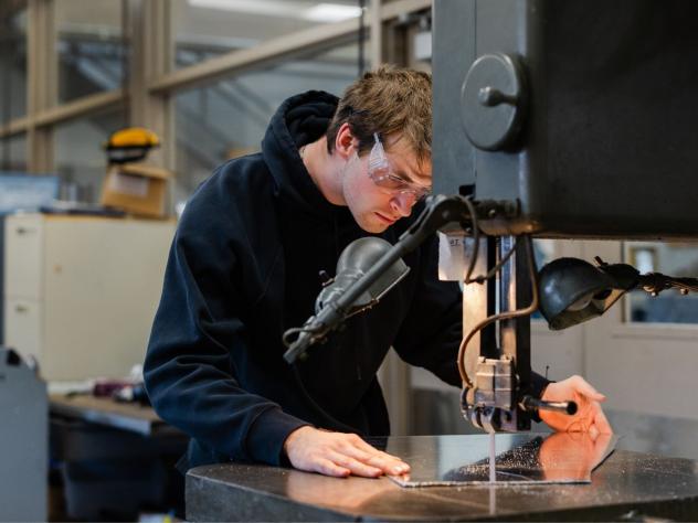 A student working in an engineering lab at Calvin University.