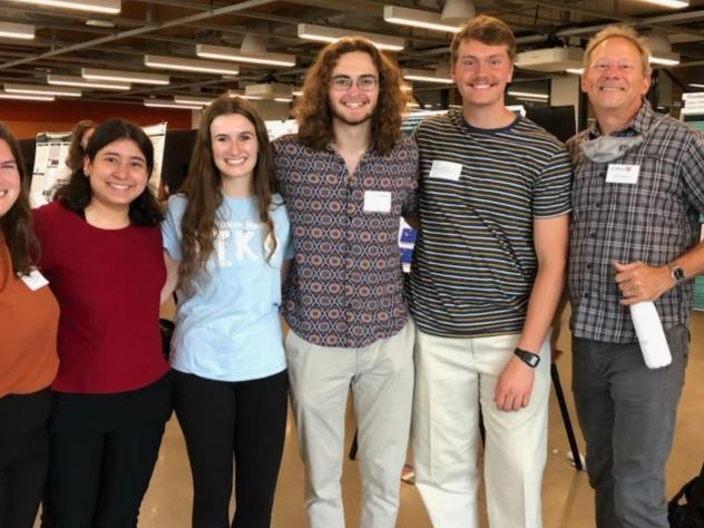 Mark Muyskens (far right) with five of his student researchers