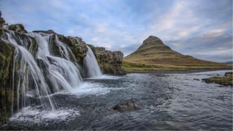 Waterfalls pour into a high-altitude stream.