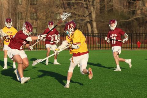 Calvin University men's lacrosse competing on the field