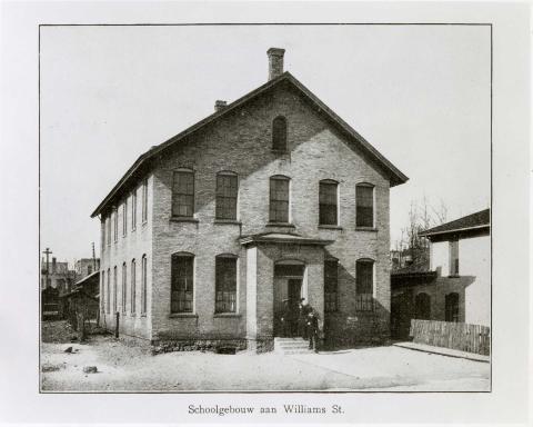 An old two-story schoolhouse on Williams St.