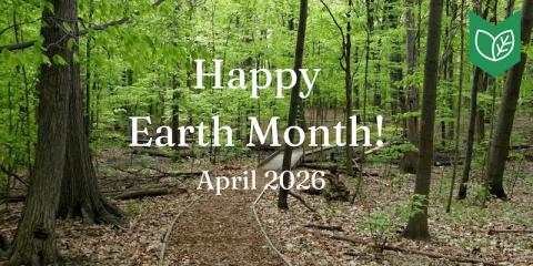 A path through woods in the summer, with green leaves and the text Happy Earth Month April 2026.